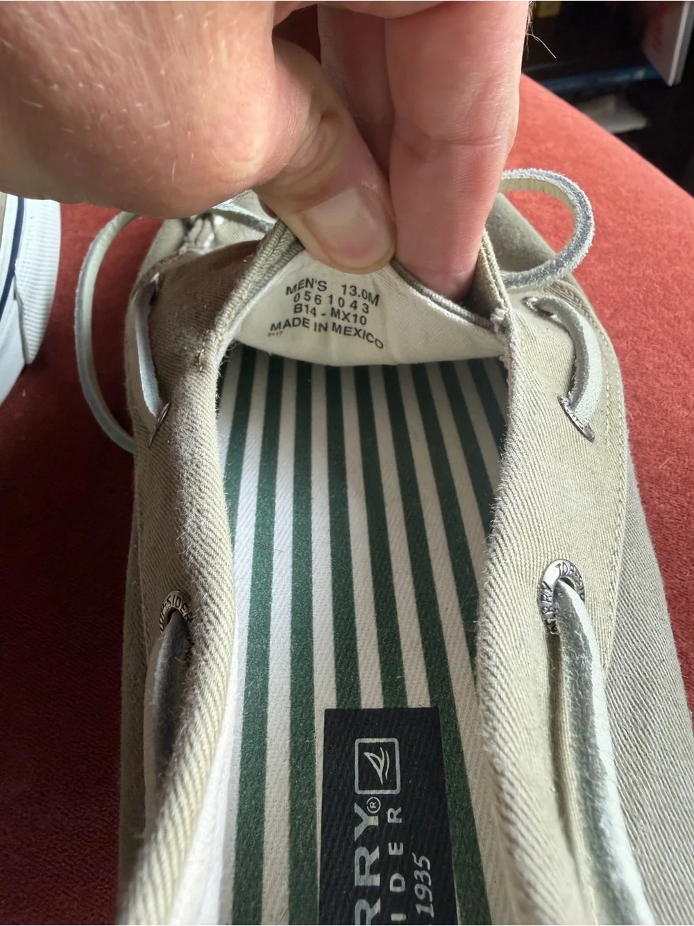 Men’s Sperry top slider canvas boat shoes in khaki.